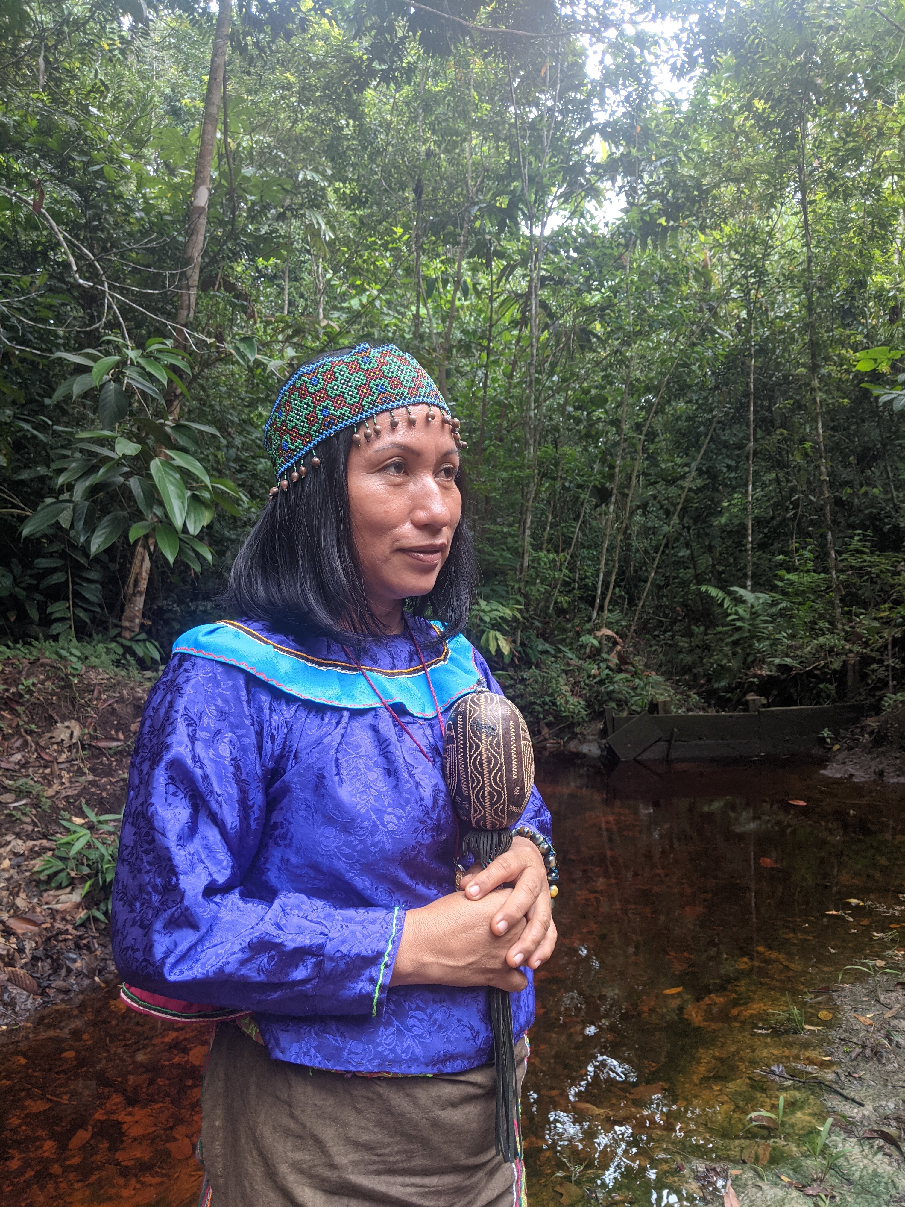 Maestra Eunice with rattle